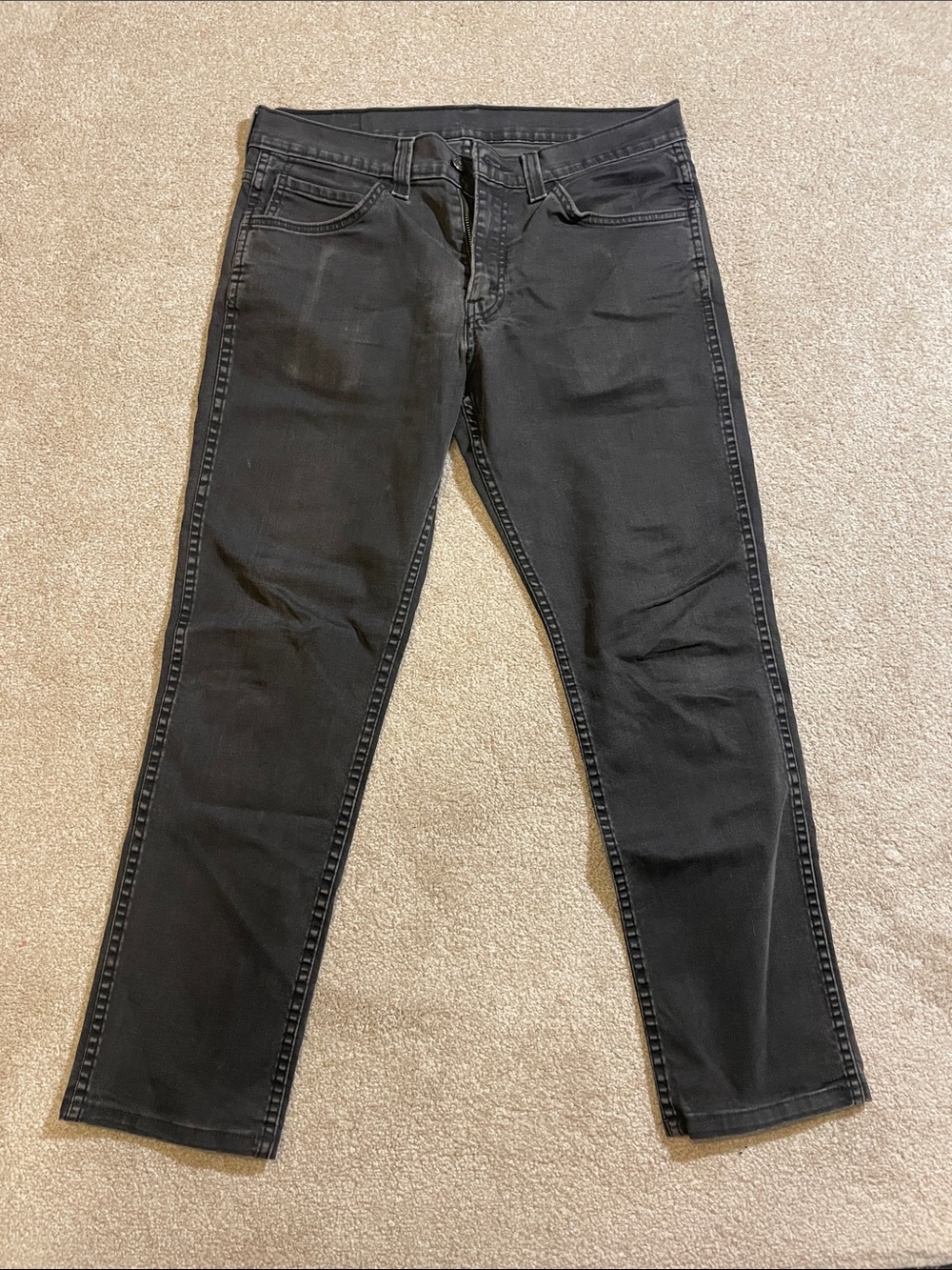Levi’s 511 faded black jeans.